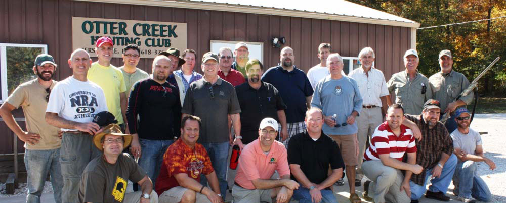 Group photo of Legacy Builders at the fall retreat gun shoot