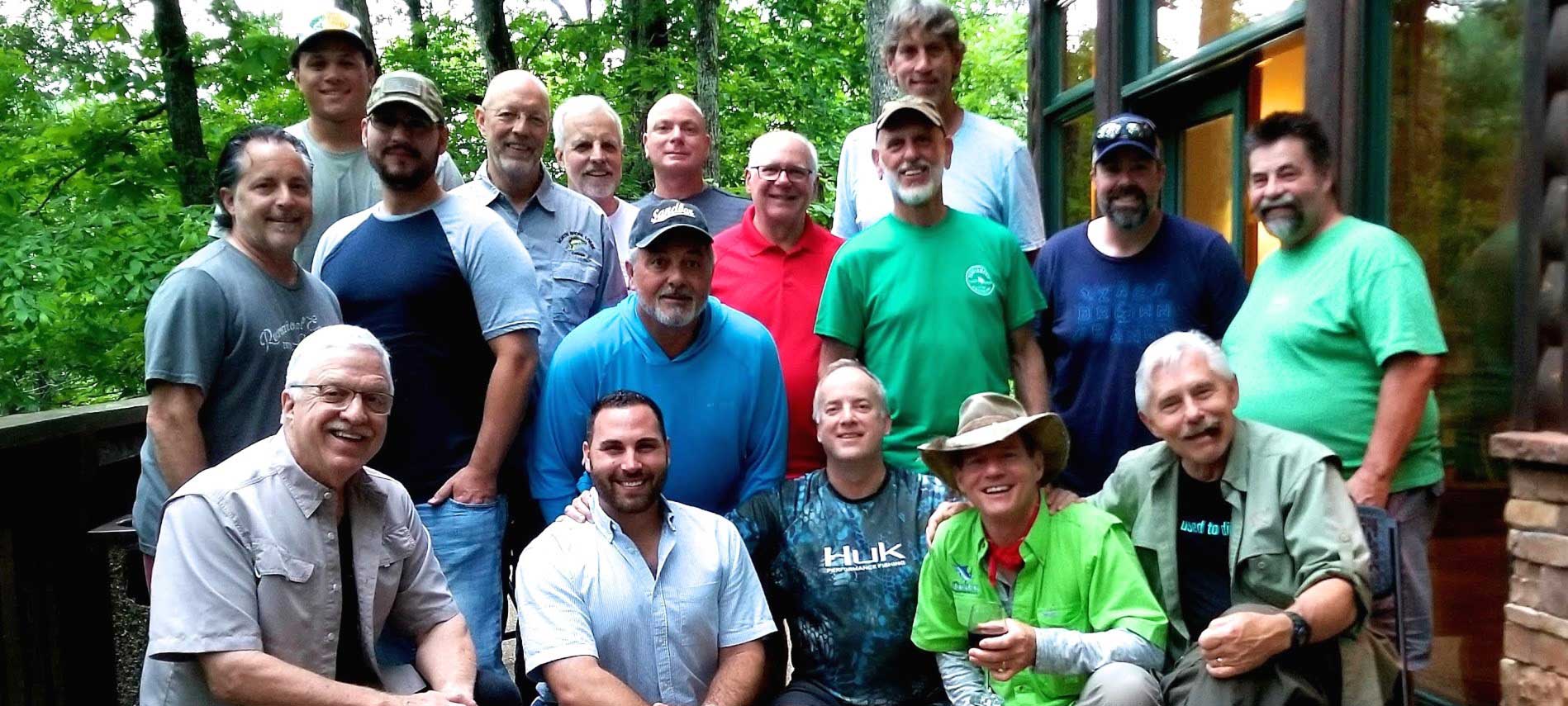 group of men enjoying the Legacy Builders fishing retreat