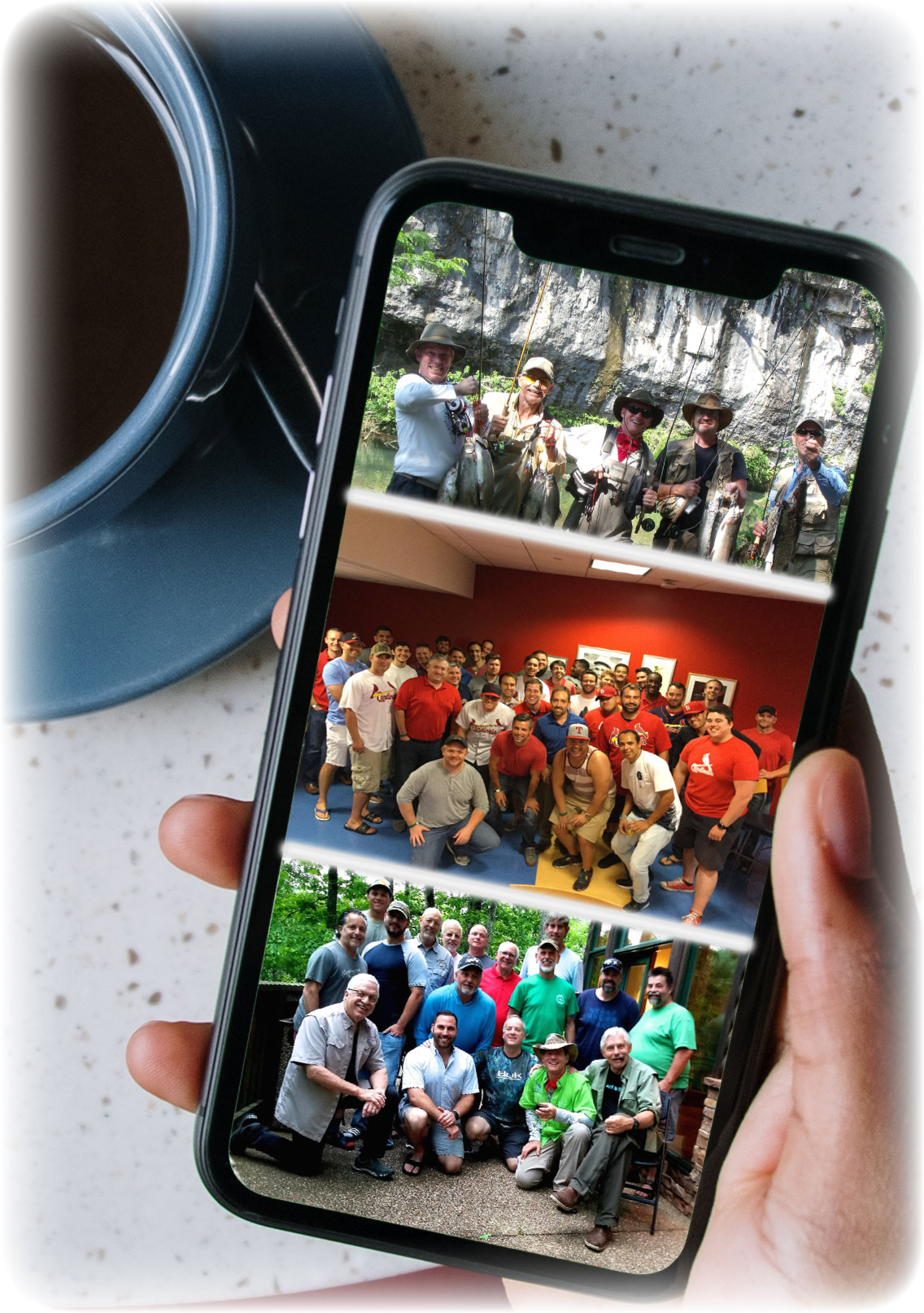 mobile phone with 3 pictures of groups of men at legacy builders ministry events