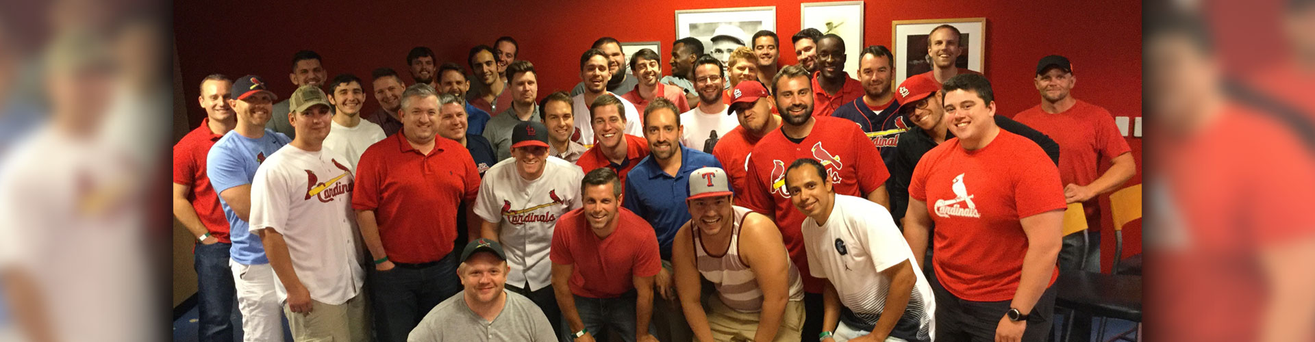 Legacy Builders group photo at a cardinals game
